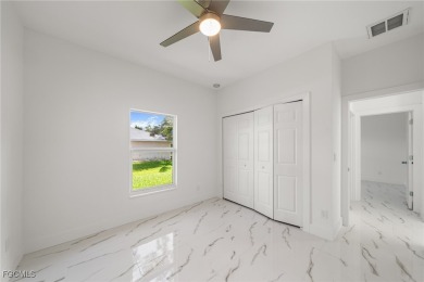 Stunning brand new modern home offering 3 bedrooms plus a on Del Tura Golf and Country Club in Florida - for sale on GolfHomes.com, golf home, golf lot