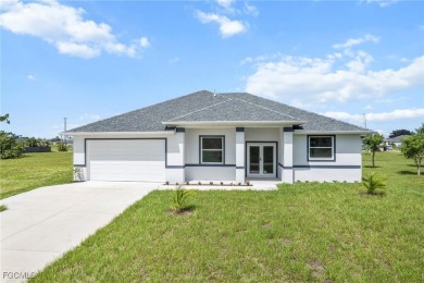Stunning brand new modern home offering 3 bedrooms plus a on Del Tura Golf and Country Club in Florida - for sale on GolfHomes.com, golf home, golf lot