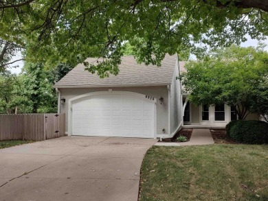 Move in ready home on a private street full of healthy mature on Tallgrass Country Club in Kansas - for sale on GolfHomes.com, golf home, golf lot