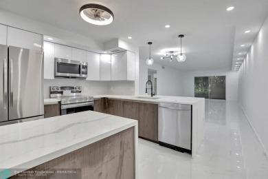 2 Bed, 2 Bath Beautifully Remodeled Luxury Interior Model
 on Wynmoor Golf Course in Florida - for sale on GolfHomes.com, golf home, golf lot