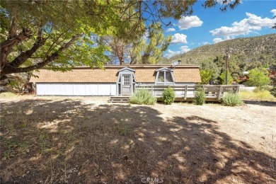 Tucked into a sunny, quiet corner of Pine Mountain Club, this on Pine Mountain Club in California - for sale on GolfHomes.com, golf home, golf lot