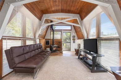 Tucked into a sunny, quiet corner of Pine Mountain Club, this on Pine Mountain Club in California - for sale on GolfHomes.com, golf home, golf lot