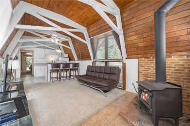 Tucked into a sunny, quiet corner of Pine Mountain Club, this on Pine Mountain Club in California - for sale on GolfHomes.com, golf home, golf lot