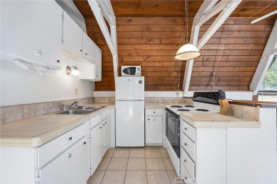 Tucked into a sunny, quiet corner of Pine Mountain Club, this on Pine Mountain Club in California - for sale on GolfHomes.com, golf home, golf lot