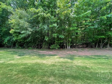 Build your dream home on this perfectly positioned lot along the on The Trail At Chickasaw Pointe in South Carolina - for sale on GolfHomes.com, golf home, golf lot