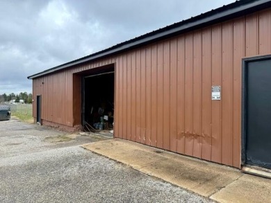 Investment Opportunity in Boyne Falls! Location, location on Boyne Mountain Resort - Alpine in Michigan - for sale on GolfHomes.com, golf home, golf lot