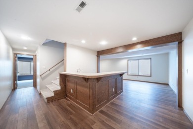 Come tour this spacious 5-bedroom home offering nearly 4,000 sq on Tallgrass Country Club in Kansas - for sale on GolfHomes.com, golf home, golf lot