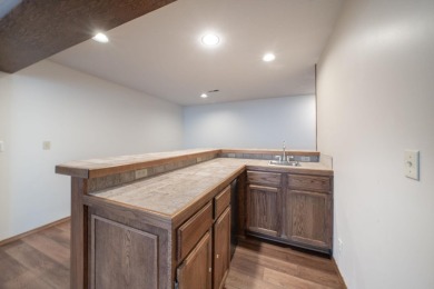 Come tour this spacious 5-bedroom home offering nearly 4,000 sq on Tallgrass Country Club in Kansas - for sale on GolfHomes.com, golf home, golf lot