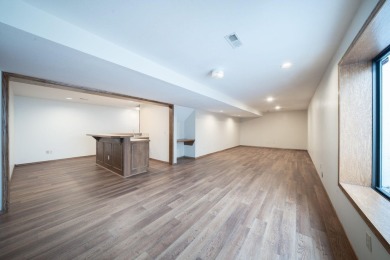 Come tour this spacious 5-bedroom home offering nearly 4,000 sq on Tallgrass Country Club in Kansas - for sale on GolfHomes.com, golf home, golf lot