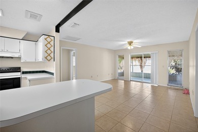 Live the carefree Florida lifestyle in this spacious 2-bedroom on Sandpiper Golf Club in Florida - for sale on GolfHomes.com, golf home, golf lot