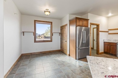 This single-family home in Montrose, Colorado offers easy living on The Bridges Golf and Country Club in Colorado - for sale on GolfHomes.com, golf home, golf lot