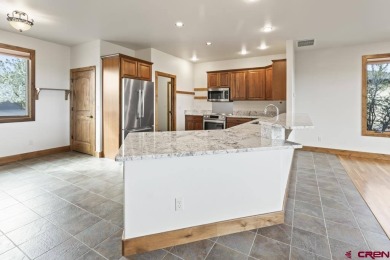 This single-family home in Montrose, Colorado offers easy living on The Bridges Golf and Country Club in Colorado - for sale on GolfHomes.com, golf home, golf lot