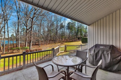 Experience lake life with unending water views, a covered slip on Stone Creek Cove Golf Course in South Carolina - for sale on GolfHomes.com, golf home, golf lot