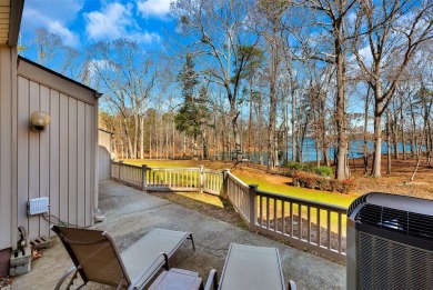 Experience lake life with unending water views, a covered slip on Stone Creek Cove Golf Course in South Carolina - for sale on GolfHomes.com, golf home, golf lot