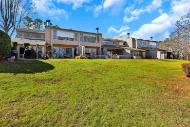 Experience lake life with unending water views, a covered slip on Stone Creek Cove Golf Course in South Carolina - for sale on GolfHomes.com, golf home, golf lot