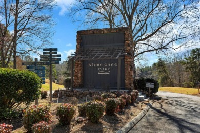 Experience lake life with unending water views, a covered slip on Stone Creek Cove Golf Course in South Carolina - for sale on GolfHomes.com, golf home, golf lot