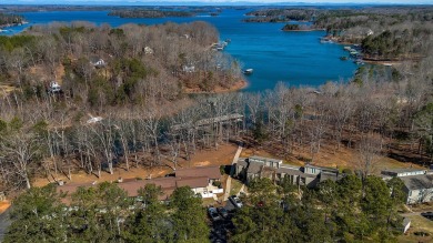 Experience lake life with unending water views, a covered slip on Stone Creek Cove Golf Course in South Carolina - for sale on GolfHomes.com, golf home, golf lot