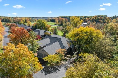 Breathtaking, completely private, setting overlooking golf on Cascade Hills Country Club in Michigan - for sale on GolfHomes.com, golf home, golf lot