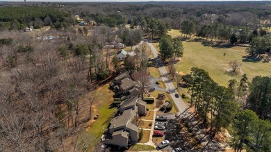 Experience lake life with unending water views, a covered slip on Stone Creek Cove Golf Course in South Carolina - for sale on GolfHomes.com, golf home, golf lot