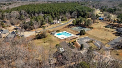 Experience lake life with unending water views, a covered slip on Stone Creek Cove Golf Course in South Carolina - for sale on GolfHomes.com, golf home, golf lot