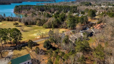 Experience lake life with unending water views, a covered slip on Stone Creek Cove Golf Course in South Carolina - for sale on GolfHomes.com, golf home, golf lot