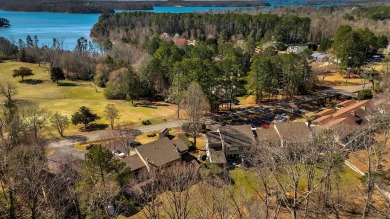 Experience lake life with unending water views, a covered slip on Stone Creek Cove Golf Course in South Carolina - for sale on GolfHomes.com, golf home, golf lot