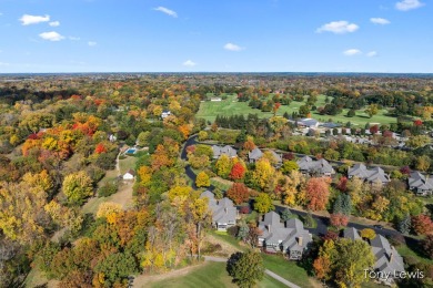 Breathtaking, completely private, setting overlooking golf on Cascade Hills Country Club in Michigan - for sale on GolfHomes.com, golf home, golf lot