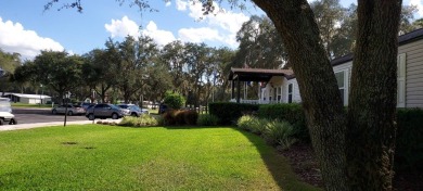 55+/2007/2 BD/2 BA/1012 SQ FT/PARK FEES ONLY $933.00/LARGE HOME on Southport Springs Golf Club in Florida - for sale on GolfHomes.com, golf home, golf lot