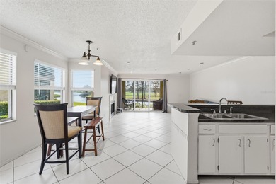 Welcome to this FIRST-FLOOR, 2 bedroom, 2 bathroom, condo on Feather Sound Country Club in Florida - for sale on GolfHomes.com, golf home, golf lot