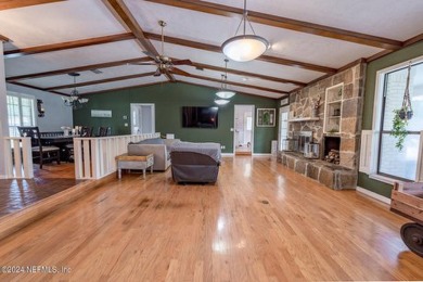 This charming white brick home has 4 bedrooms and 3 baths on Starke Golf and Country Club in Florida - for sale on GolfHomes.com, golf home, golf lot