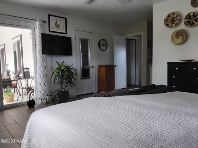Inviting single-level golf course home with mountain views! on Prescott Golf and Country Club in Arizona - for sale on GolfHomes.com, golf home, golf lot