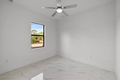 Corner lot new construction offering 3 bedrooms and 2 bathrooms on Lehigh Resort Club in Florida - for sale on GolfHomes.com, golf home, golf lot