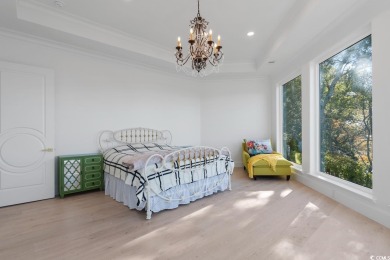 Experience the ultimate in lakefront luxury with this on Oyster Bay Golf Links in South Carolina - for sale on GolfHomes.com, golf home, golf lot