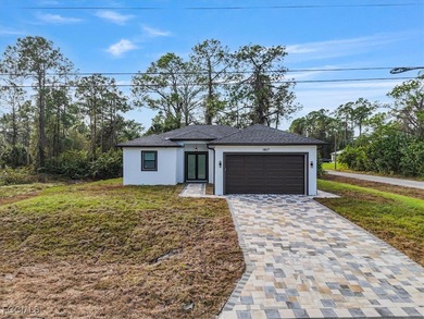 Corner lot new construction offering 3 bedrooms and 2 bathrooms on Lehigh Resort Club in Florida - for sale on GolfHomes.com, golf home, golf lot