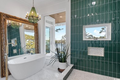 Experience the ultimate in lakefront luxury with this on Oyster Bay Golf Links in South Carolina - for sale on GolfHomes.com, golf home, golf lot
