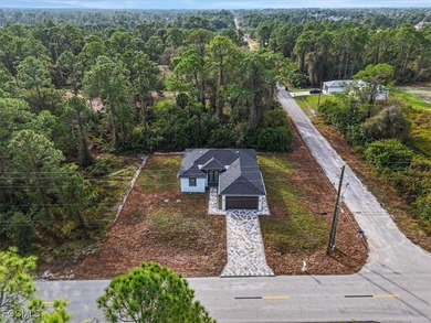Corner lot new construction offering 3 bedrooms and 2 bathrooms on Lehigh Resort Club in Florida - for sale on GolfHomes.com, golf home, golf lot