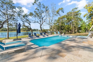Experience the ultimate in lakefront luxury with this on Oyster Bay Golf Links in South Carolina - for sale on GolfHomes.com, golf home, golf lot