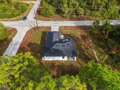 Corner lot new construction offering 3 bedrooms and 2 bathrooms on Lehigh Resort Club in Florida - for sale on GolfHomes.com, golf home, golf lot