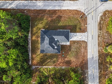 Corner lot new construction offering 3 bedrooms and 2 bathrooms on Lehigh Resort Club in Florida - for sale on GolfHomes.com, golf home, golf lot