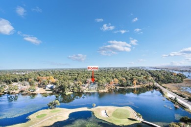 Experience the ultimate in lakefront luxury with this on Oyster Bay Golf Links in South Carolina - for sale on GolfHomes.com, golf home, golf lot