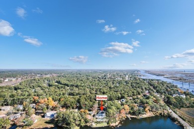 Experience the ultimate in lakefront luxury with this on Oyster Bay Golf Links in South Carolina - for sale on GolfHomes.com, golf home, golf lot