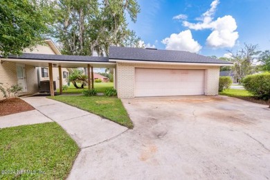 This charming white brick home has 4 bedrooms and 3 baths on Starke Golf and Country Club in Florida - for sale on GolfHomes.com, golf home, golf lot