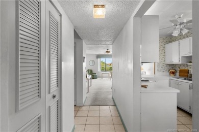 Don't miss this 2-bed, 2-bath condominium in the private on Miles Grant Country Club in Florida - for sale on GolfHomes.com, golf home, golf lot