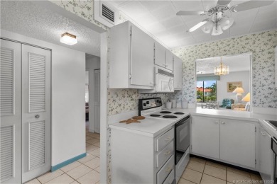 Don't miss this 2-bed, 2-bath condominium in the private on Miles Grant Country Club in Florida - for sale on GolfHomes.com, golf home, golf lot