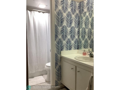 Escape to this stunning 2bedroom, 2bathroom apartment, boasting on Pine Island Ridge Country Club in Florida - for sale on GolfHomes.com, golf home, golf lot