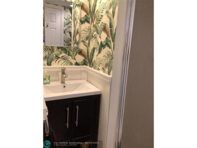 Escape to this stunning 2bedroom, 2bathroom apartment, boasting on Pine Island Ridge Country Club in Florida - for sale on GolfHomes.com, golf home, golf lot