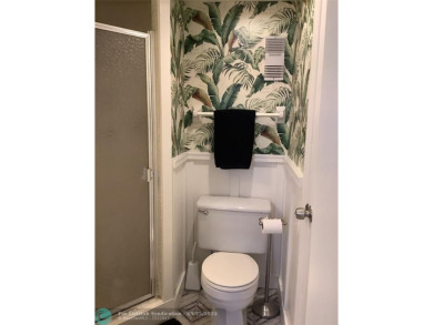 Escape to this stunning 2bedroom, 2bathroom apartment, boasting on Pine Island Ridge Country Club in Florida - for sale on GolfHomes.com, golf home, golf lot