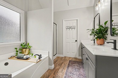 Step into modern sophistication in this beautifully updated home on Bridgemill Golf Club in Georgia - for sale on GolfHomes.com, golf home, golf lot