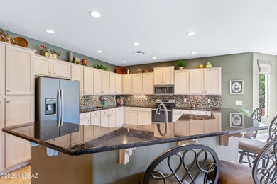 This gorgeous, oversized lot with lush landscaping and bordering on Quail Creek Country Club  in Arizona - for sale on GolfHomes.com, golf home, golf lot