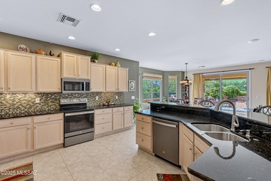 This gorgeous, oversized lot with lush landscaping and bordering on Quail Creek Country Club  in Arizona - for sale on GolfHomes.com, golf home, golf lot